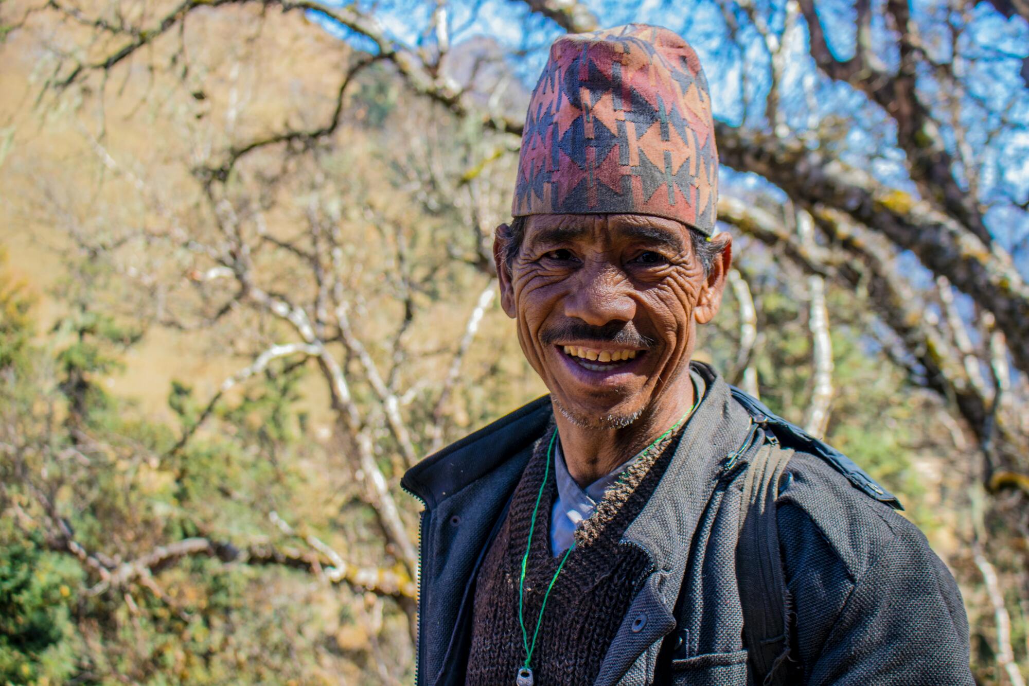 Man wearing a topi, Nepal - By Mountain People