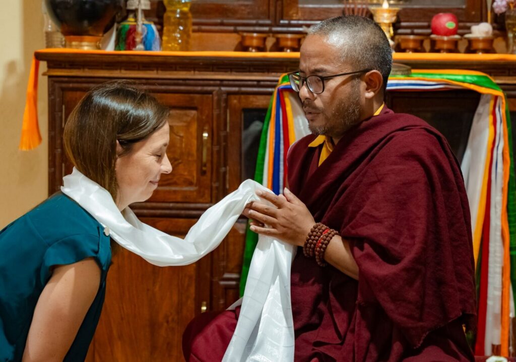 Buddhist Monk and Rosalie Lighting Up in Nepal The Inner Expedition By Mountain People